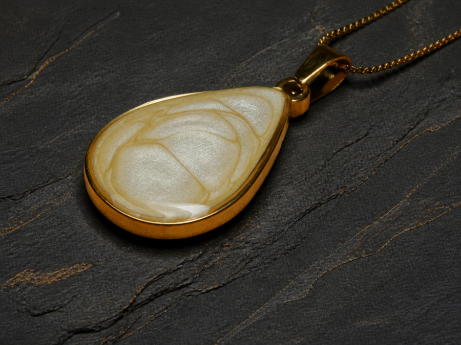 Ivory Strata teardrop pendant flat-lay angle