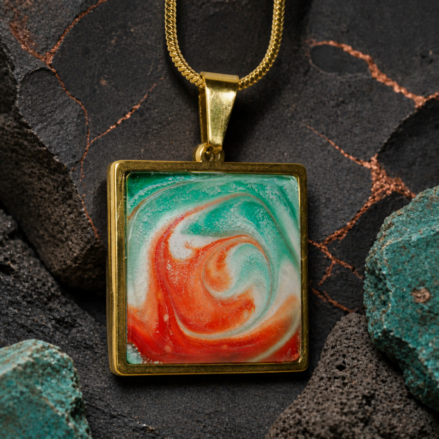 Square 18K gold-plated pendant with turquoise and coral ink and resin art on dark slate
