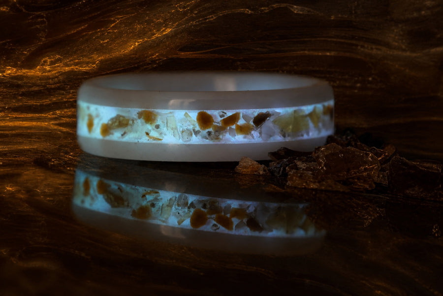 Resin of Time: Afterglow ring with subtle blue-white afterglow on fossil amber resin