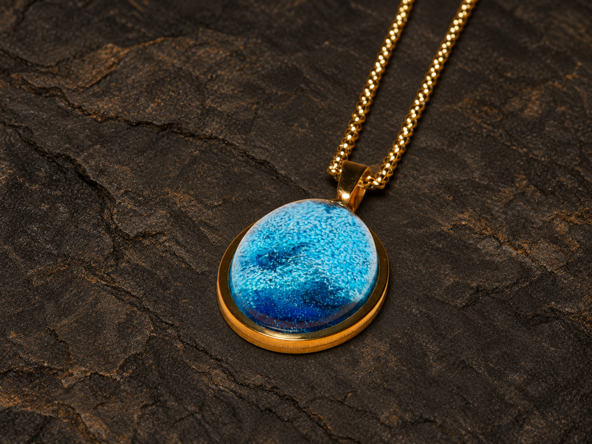 Abyssal Horizon blue oval pendant angled close-up