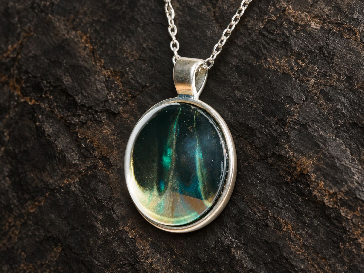 Verdant Rift hand-painted round pendant close-up