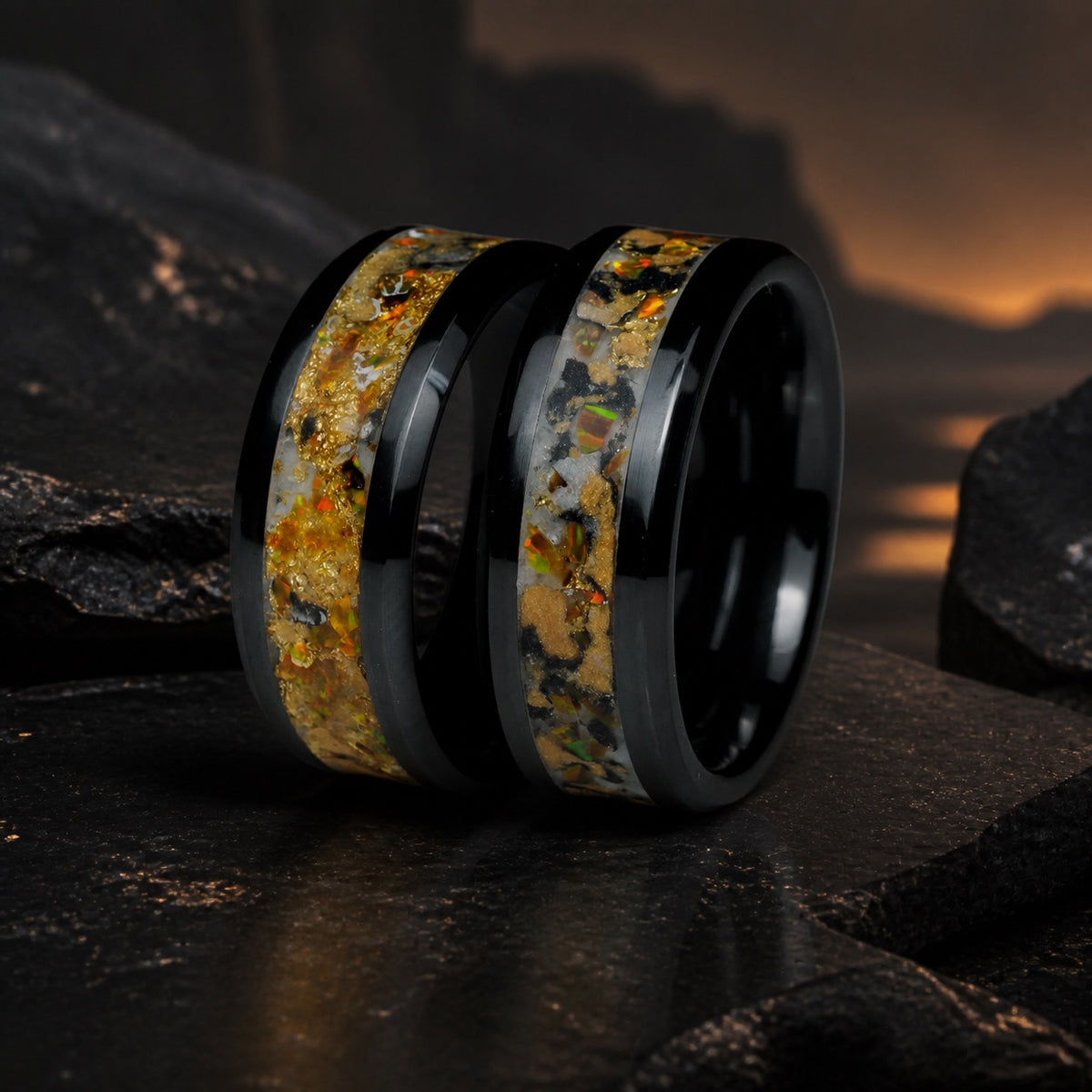Pair of Gilded Eventide rings in a dark eventide mineral setting