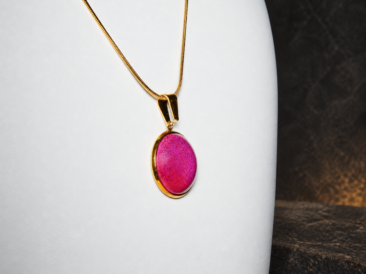 Rose Strata pink disc pendant, angled view