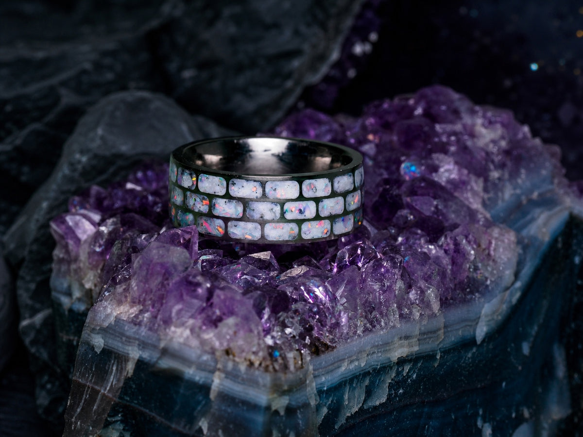 Close view of the Titanium Opal Glow Ring on amethyst crystals