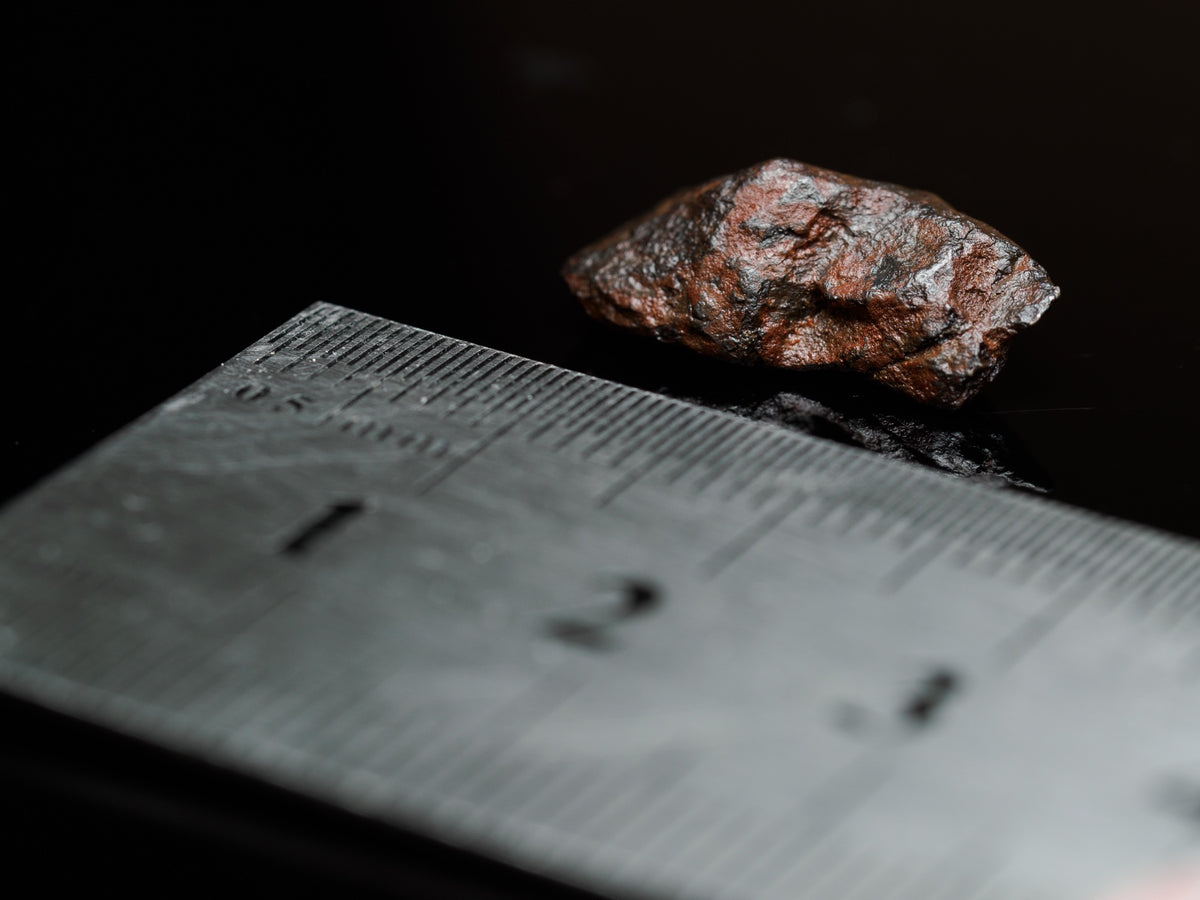 Mundrabilla Iron Meteorite Fragment — 3 g, Western Australia, meteorite specimen, angled view.