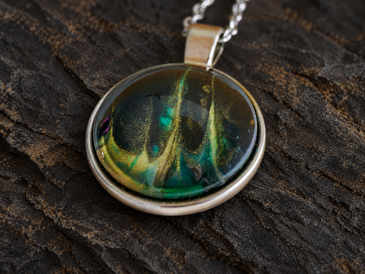 Verdant Rift hand-painted black, emerald and gold pendant detail