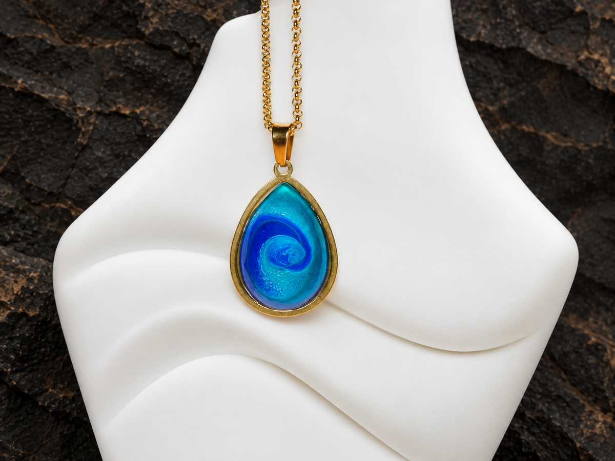 Abyssal Current blue teardrop pendant hanging front view