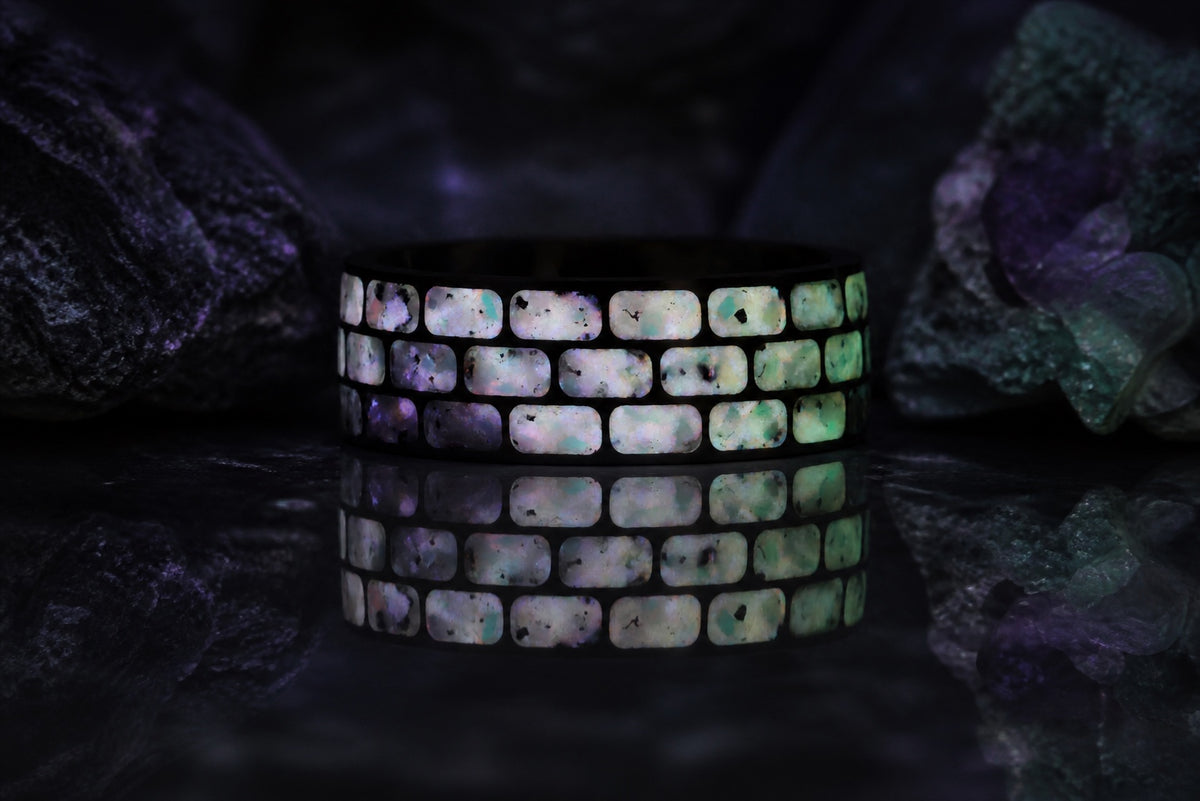 Close detail of the Titanium Opal Glow Ring glowing in low light