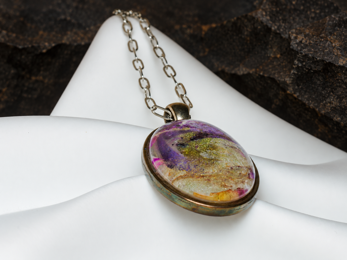 Violet Strata oval pendant angled close-up