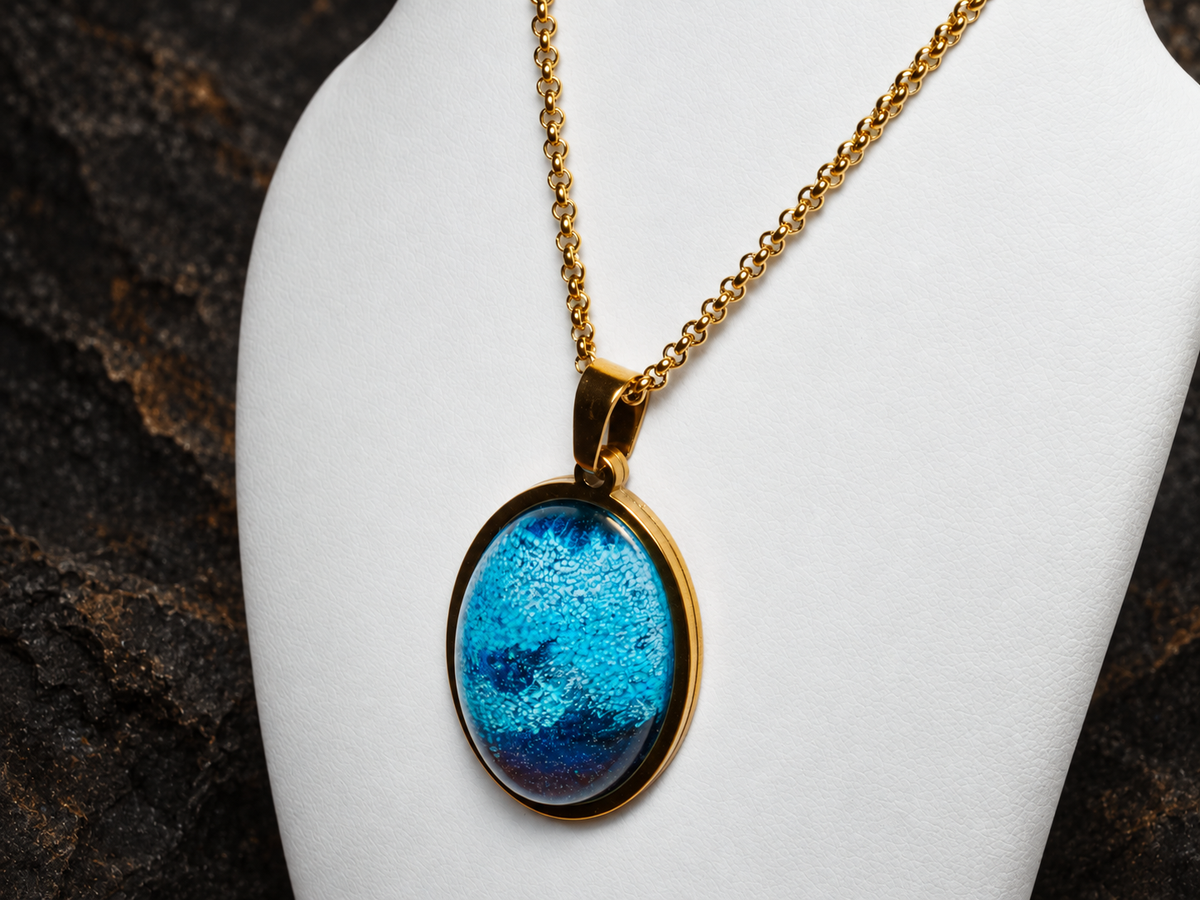 Abyssal Horizon oval pendant and gold chain detail