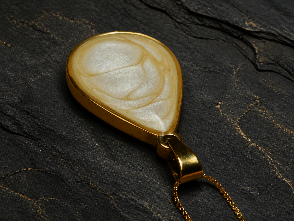 Ivory Strata pearlescent enamel and resin pendant detail