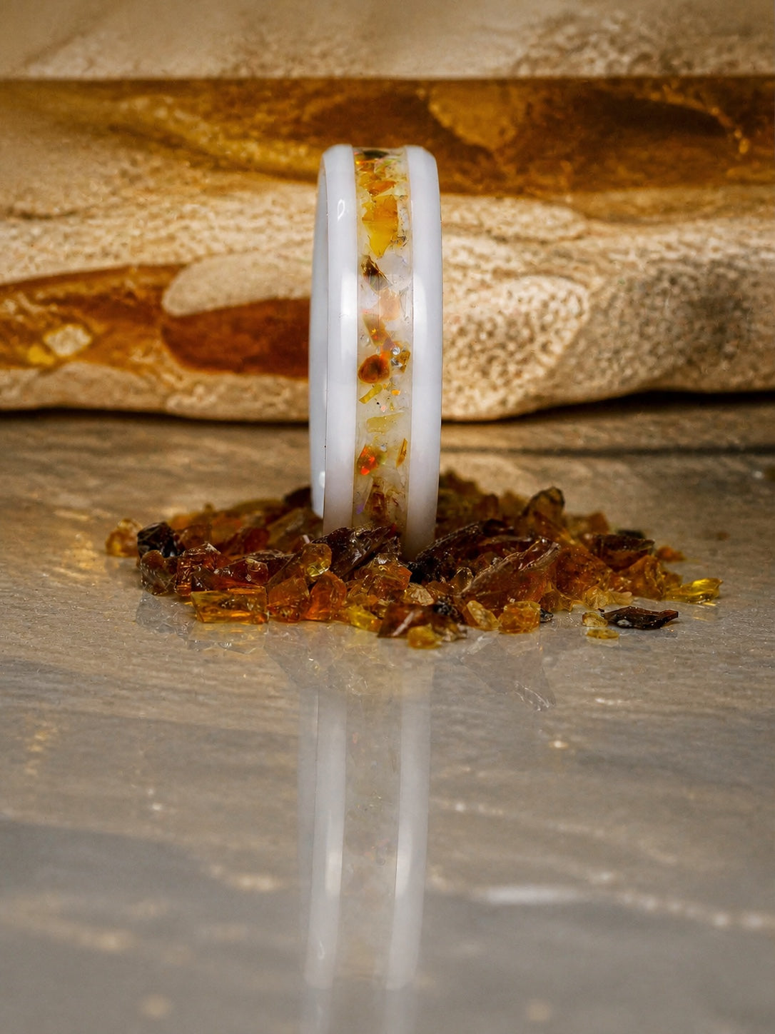 Upright Resin of Time: Afterglow ring with amber strata and reflection