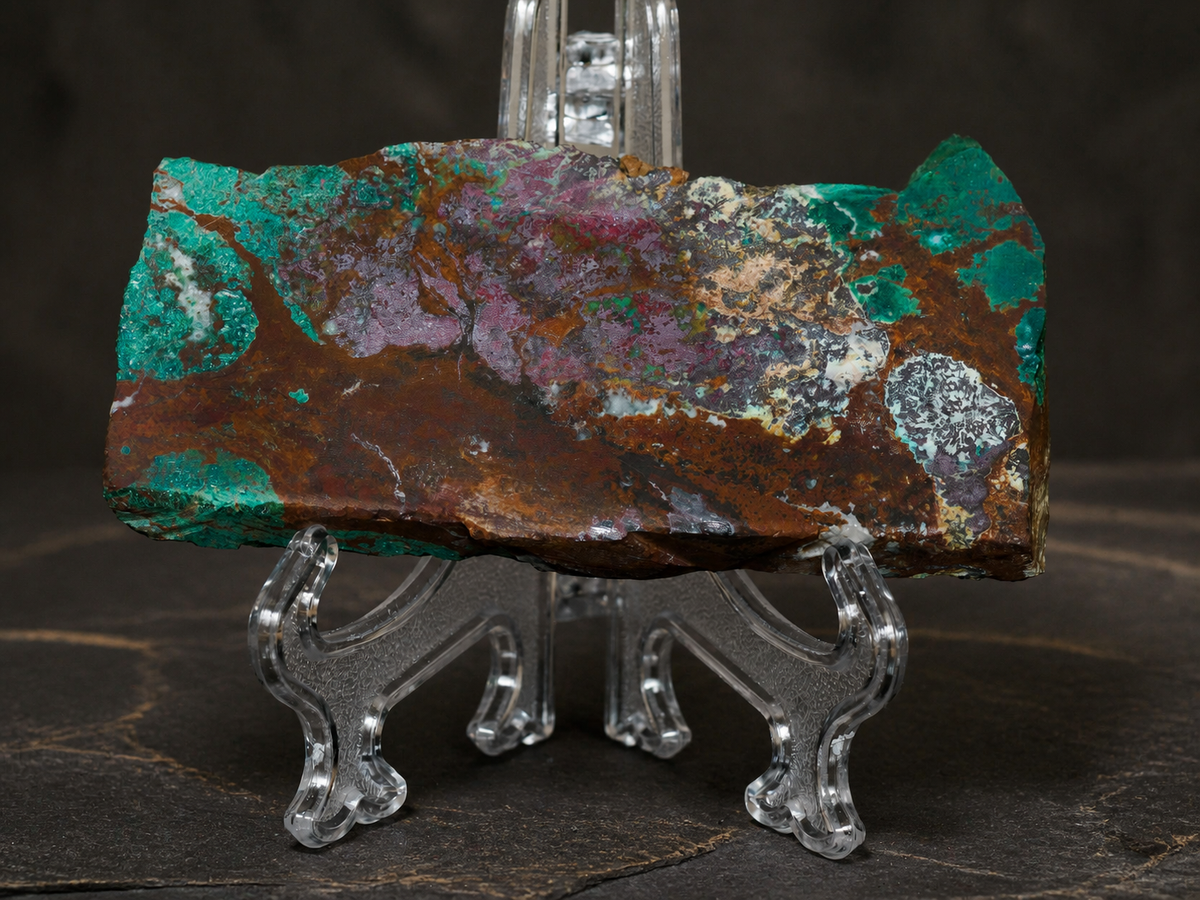 DeGrussa malachite with cuprite specimen on clear acrylic stand, horizontal view
