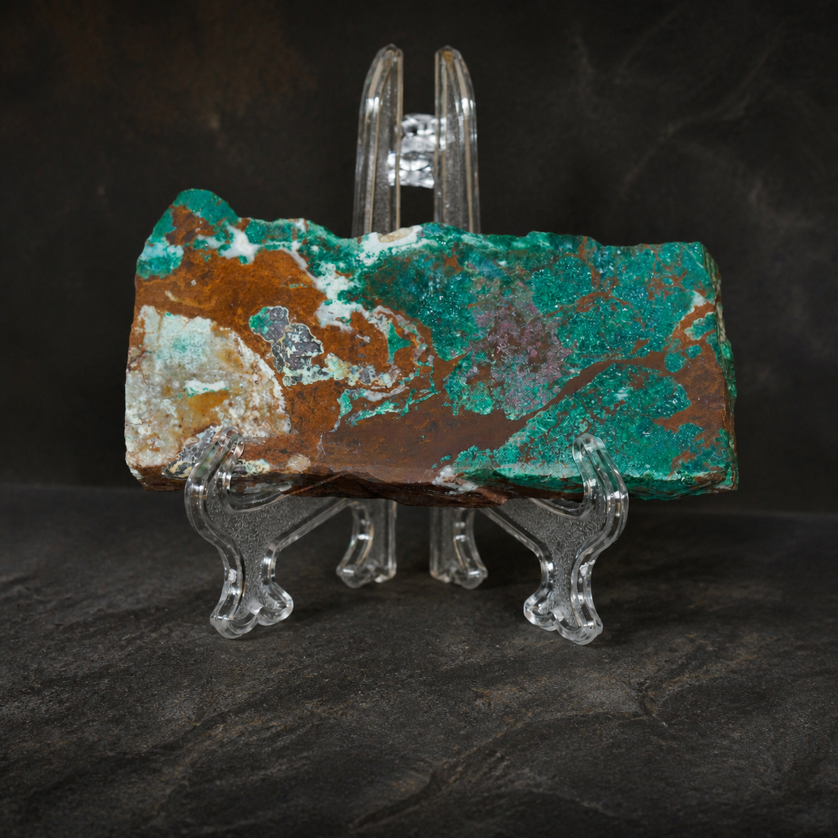 DeGrussa malachite with cuprite specimen displayed on clear acrylic stand