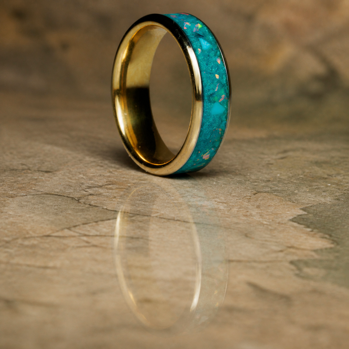 Tidal Archive Ring upright three-quarter view on warm mineral stone