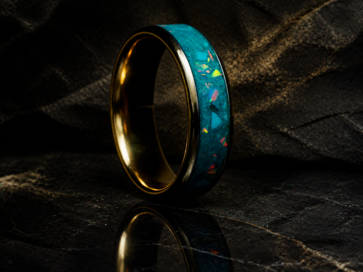 Tidal Archive Ring upright view on dark reflective geological slate