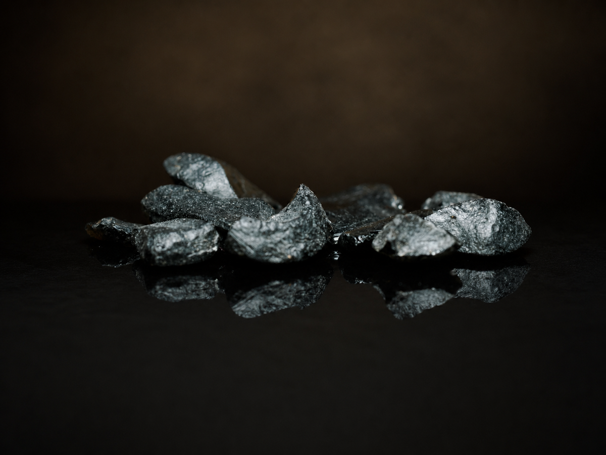Australite Tektite Chips — Western Australia (2 g), impact-glass specimen, front view.