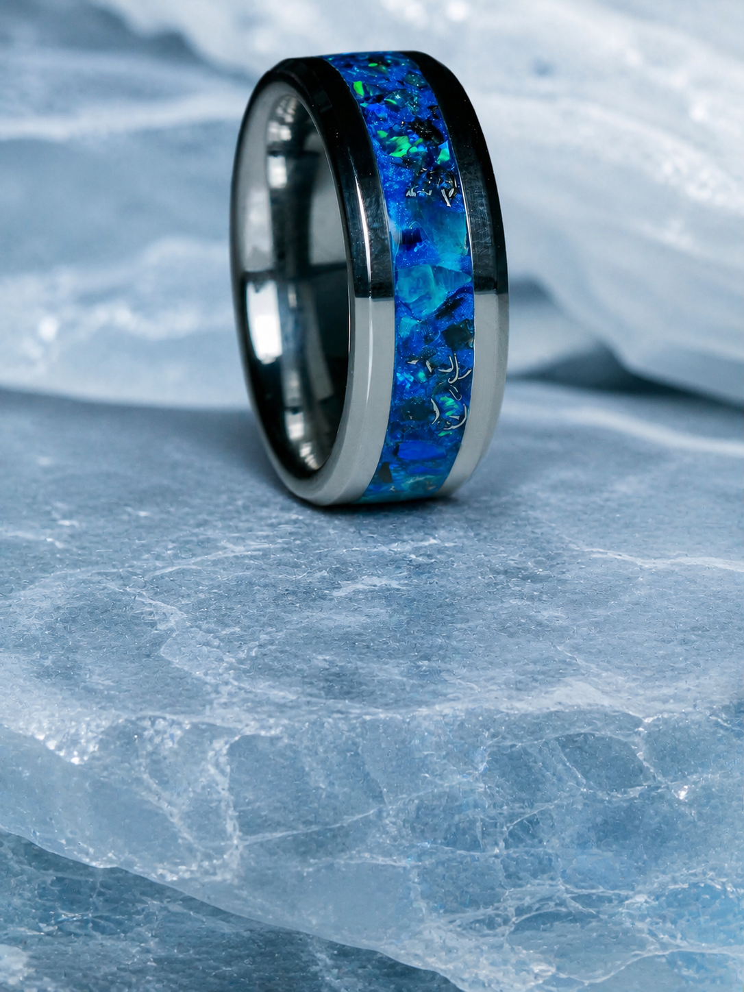 Abyssal Impact angled blue opal and meteorite ring on frosted ice