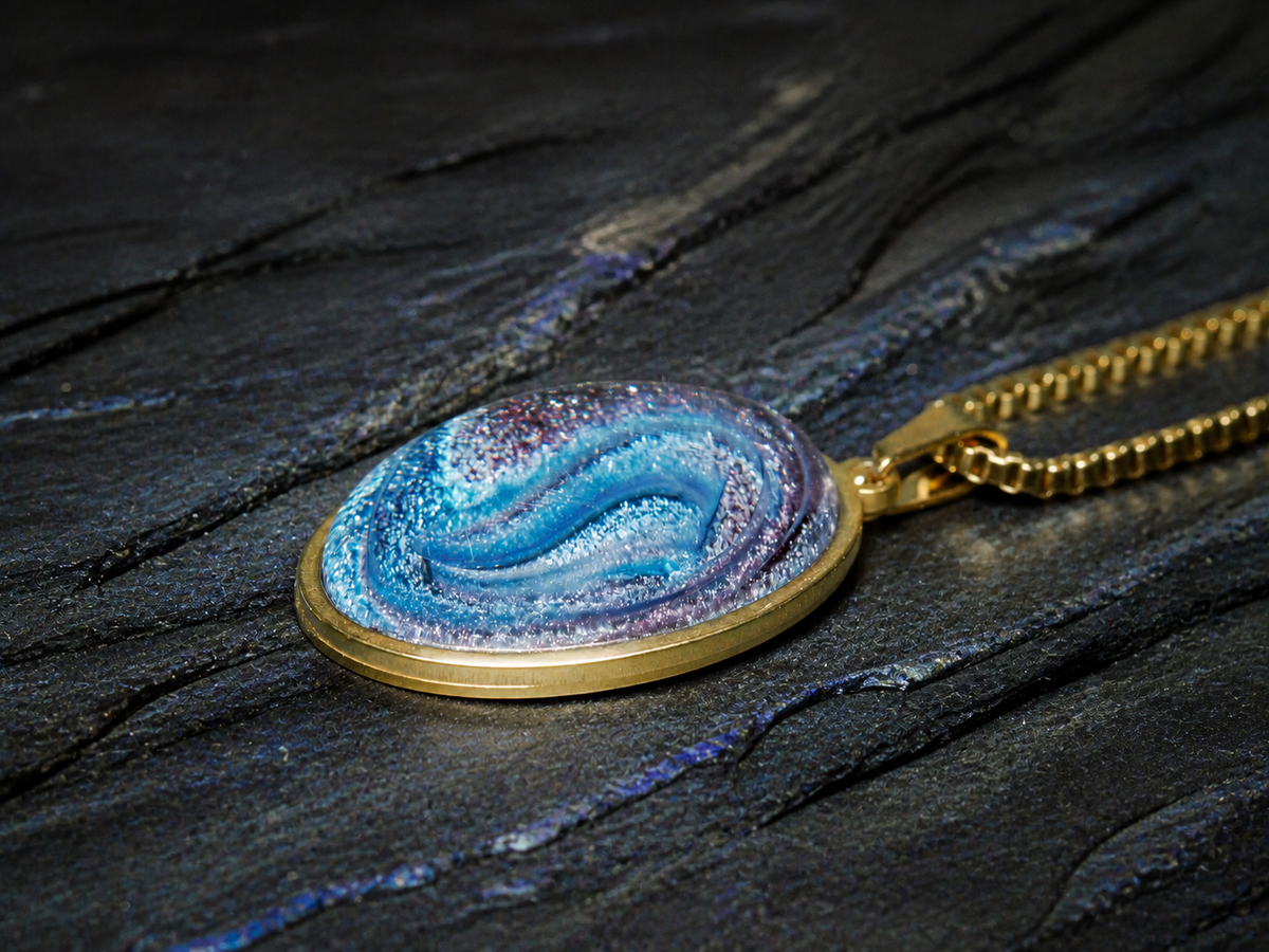 Low angle view of the Abyssal Spiral blue-violet resin dome pendant