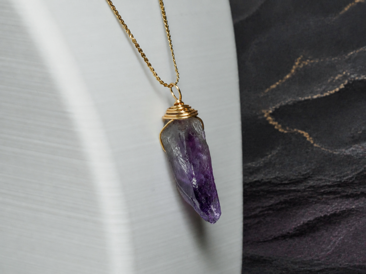 Twilight Vein natural amethyst gold-wrapped pendant necklace on display bust