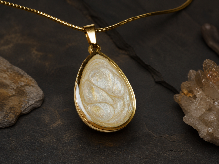 Ancient Light Pendant on a dark mineral surface with crystal accents