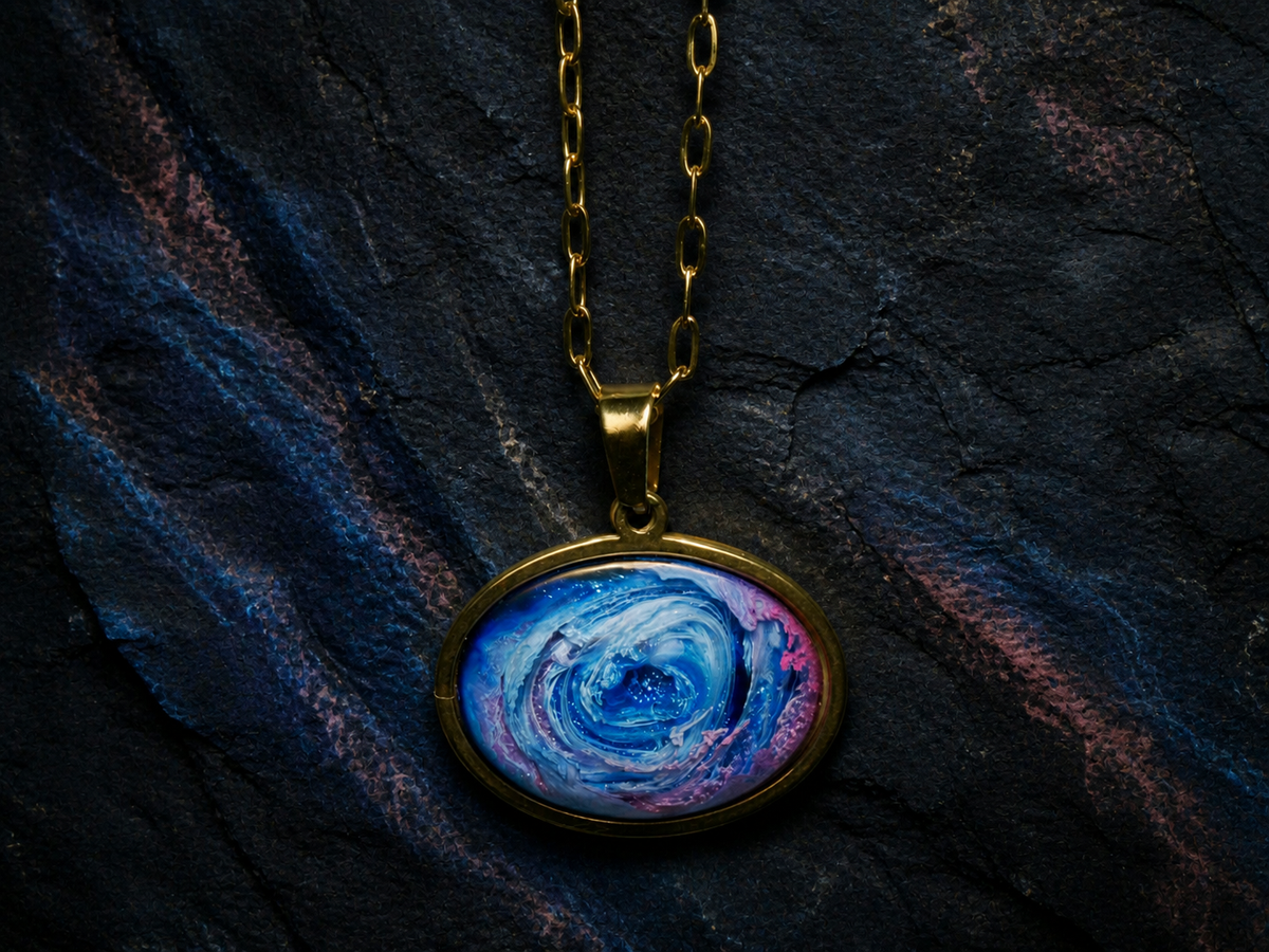 Astral Tide pendant on a 55cm 18k gold plated chain