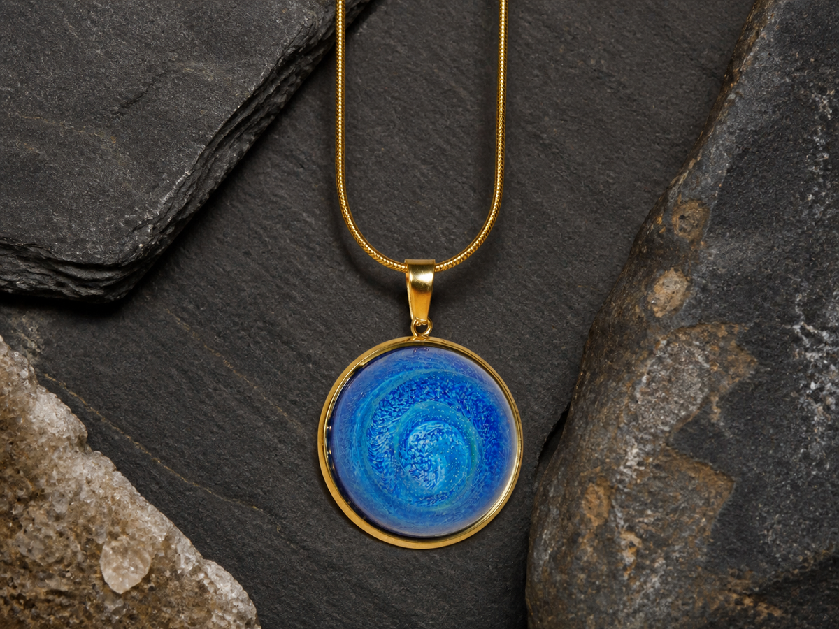 Full front view of blue alcohol-ink resin necklace with 18K gold-plated chain