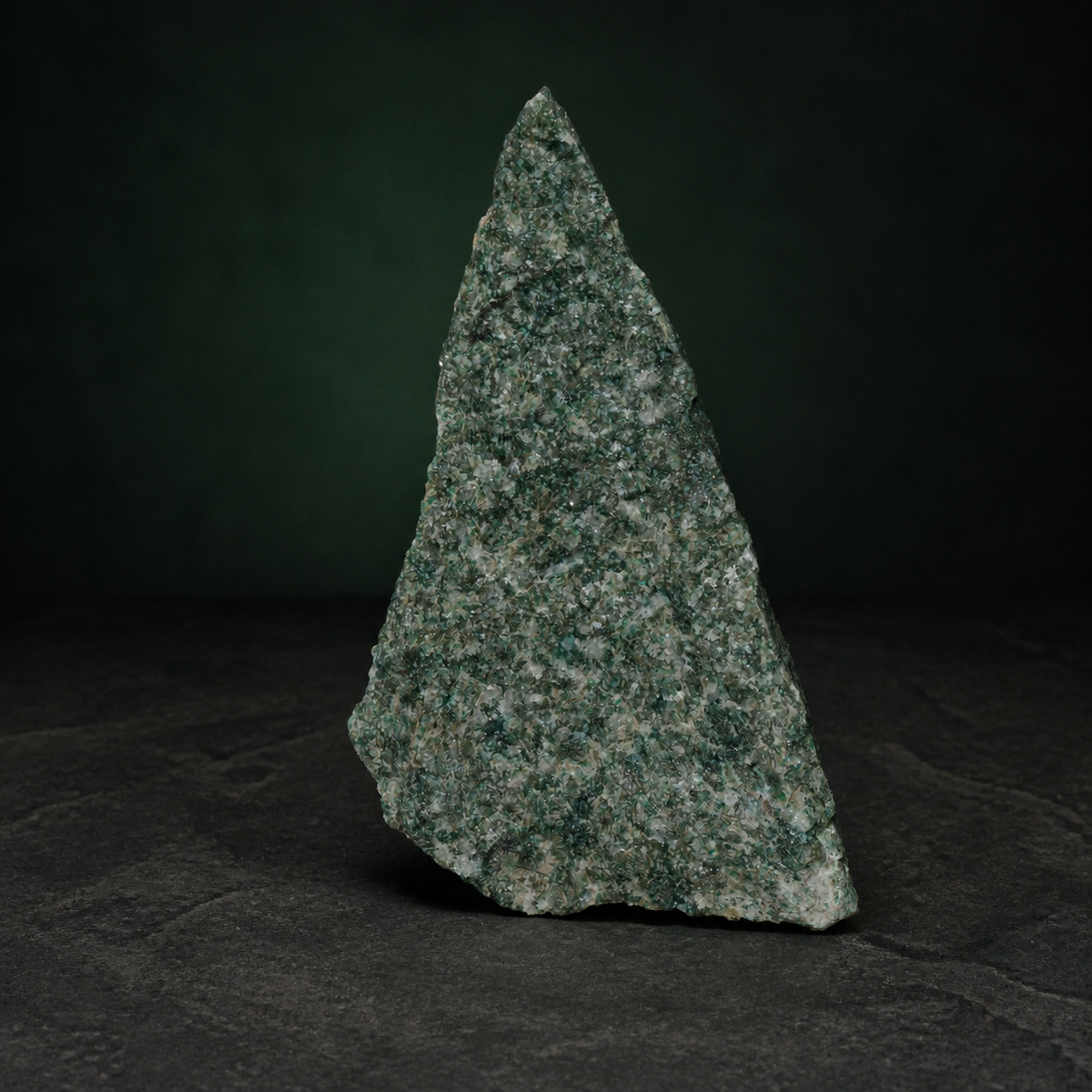 Front view of a fuchsite quartzite display specimen with green mica