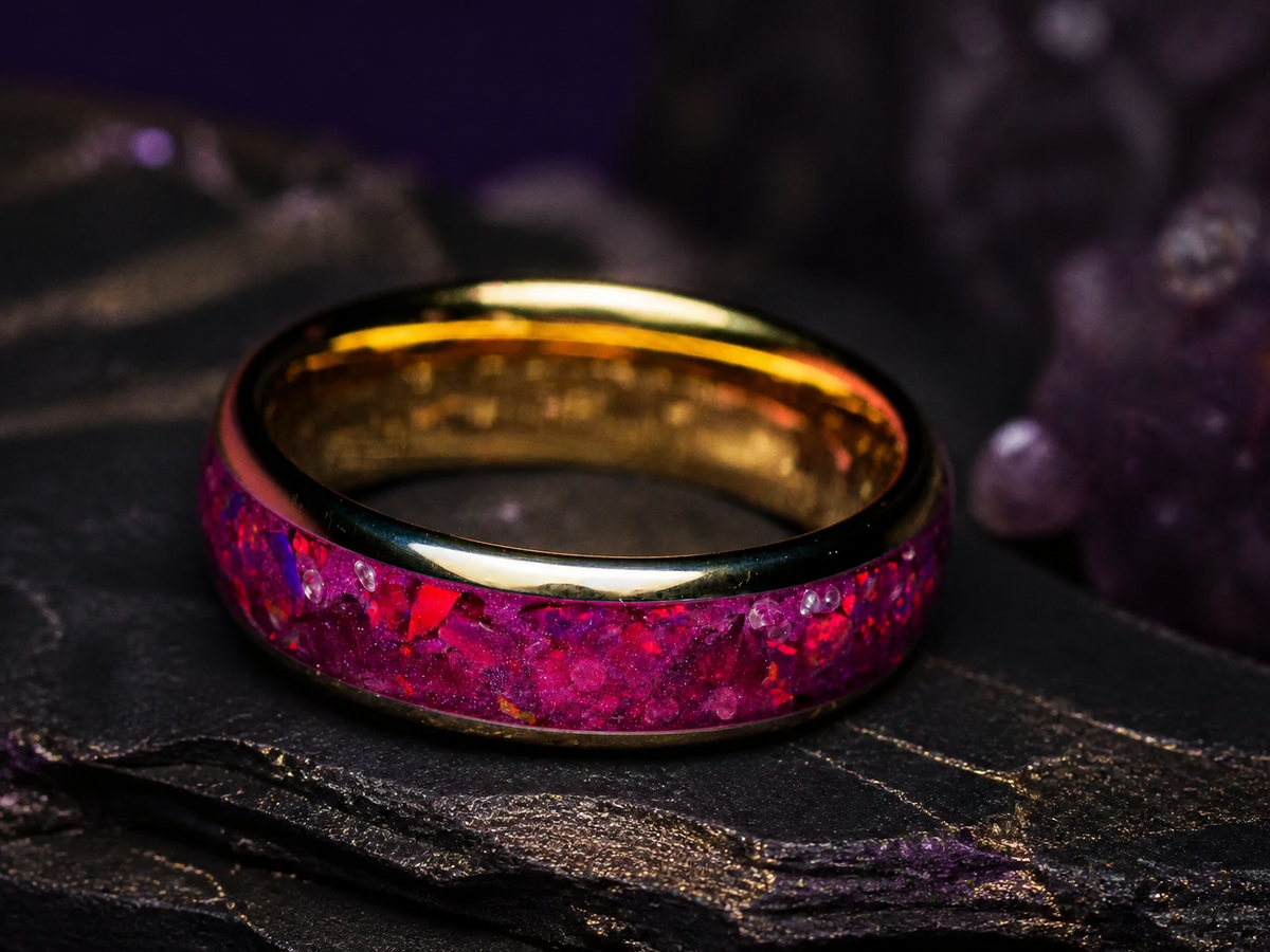 Imperial Nocturne ring close-up showing crimson garnet fragments and gold-coated band