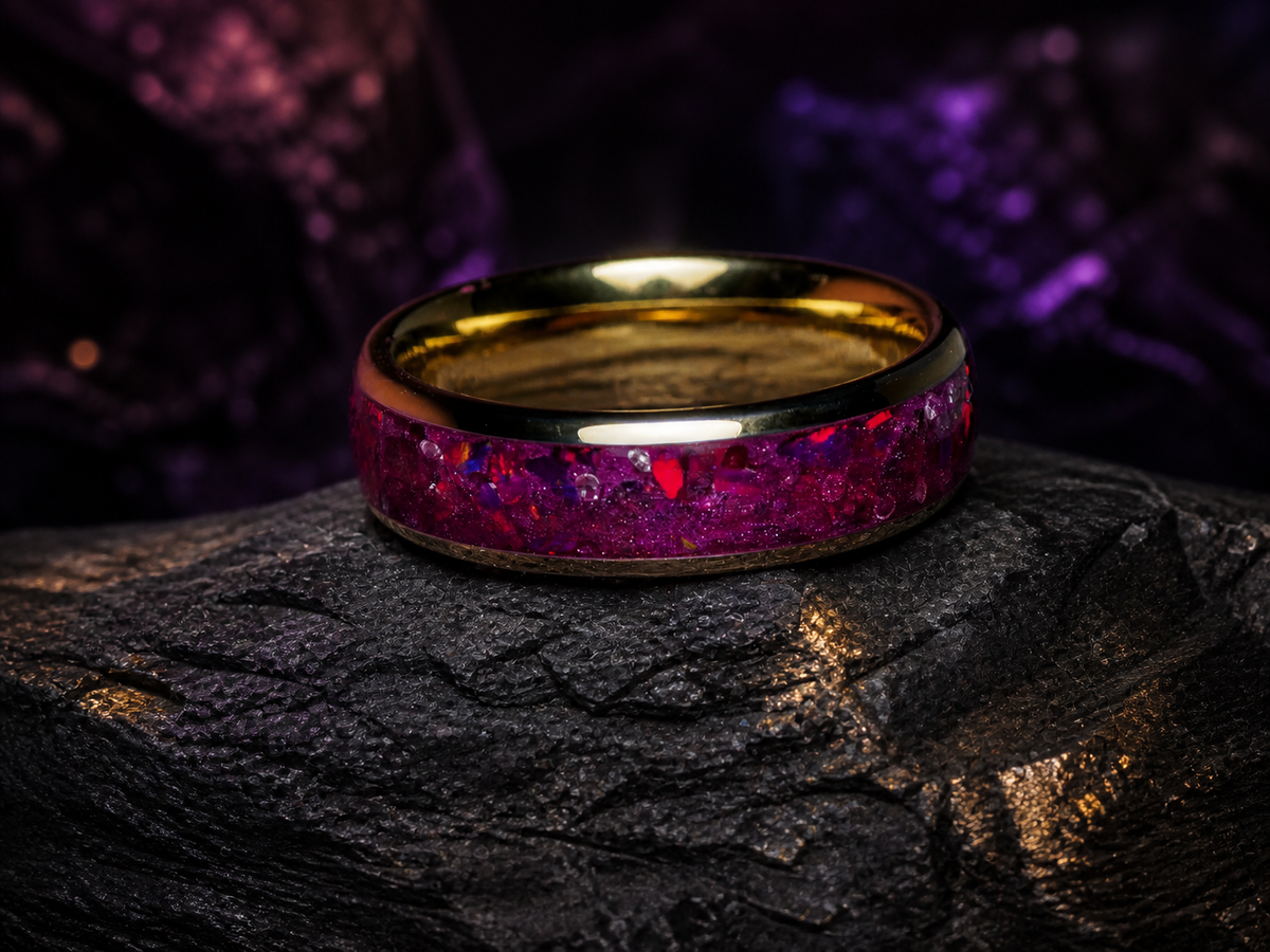 Imperial Nocturne upright ring on a clear display against dark mineral stone
