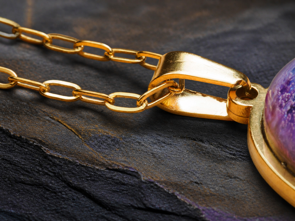 18K gold-plated bail and chain detail beside the Lavender Reef oval pendant
