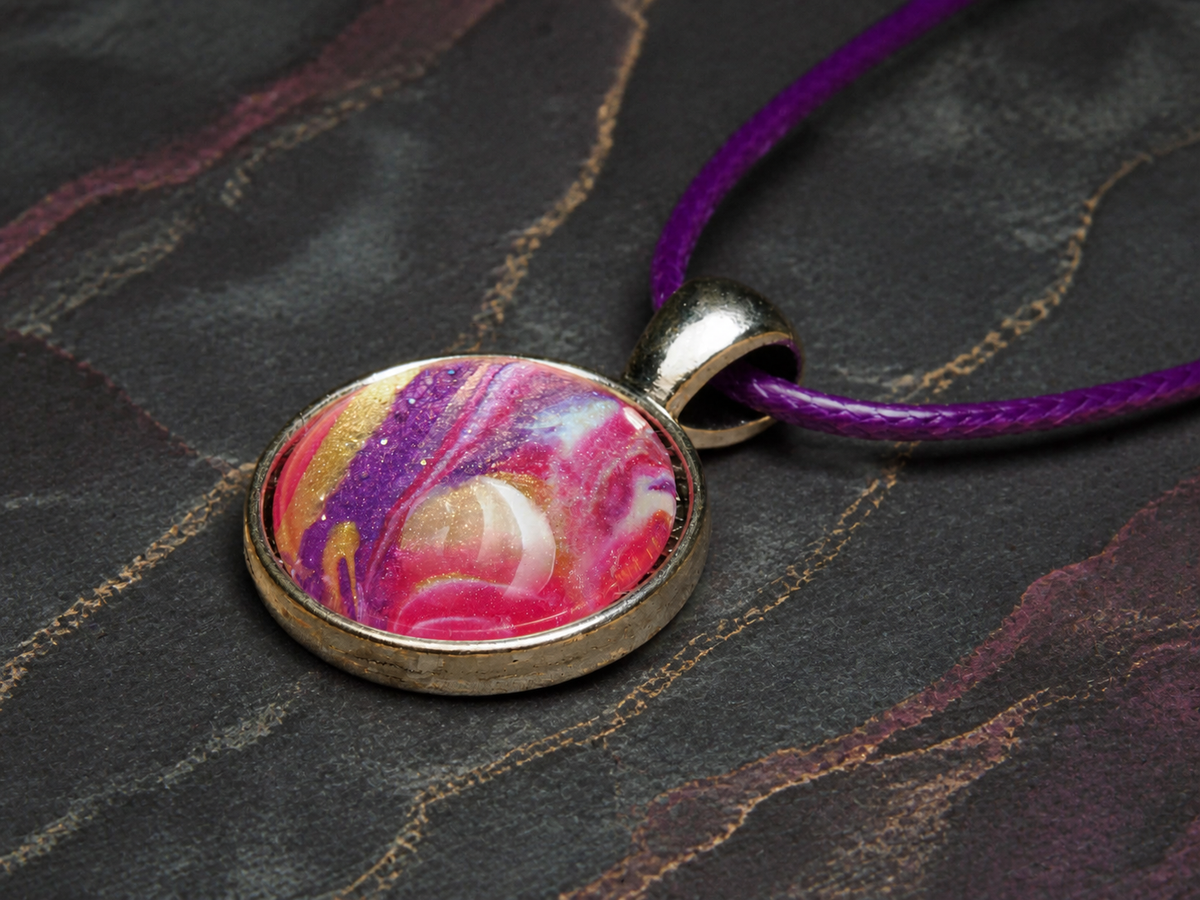 Low-profile view of the Magenta Strata resin dome and purple cord