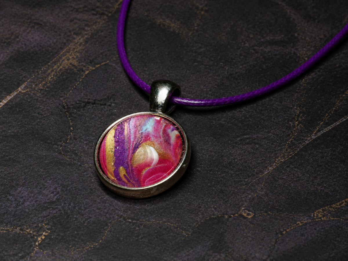 Detailed flat-lay view of the round silver pendant