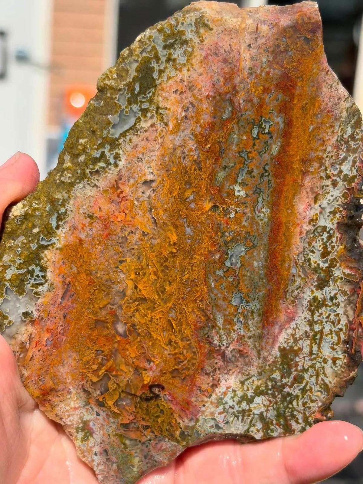 Supplier close-up photograph of the moss agate slab showing its detailed inclusions