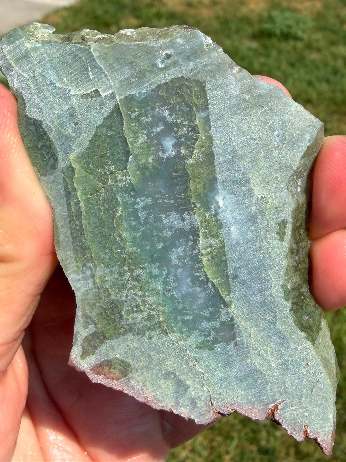 Supplier photograph of a green moss agate slab, reverse view