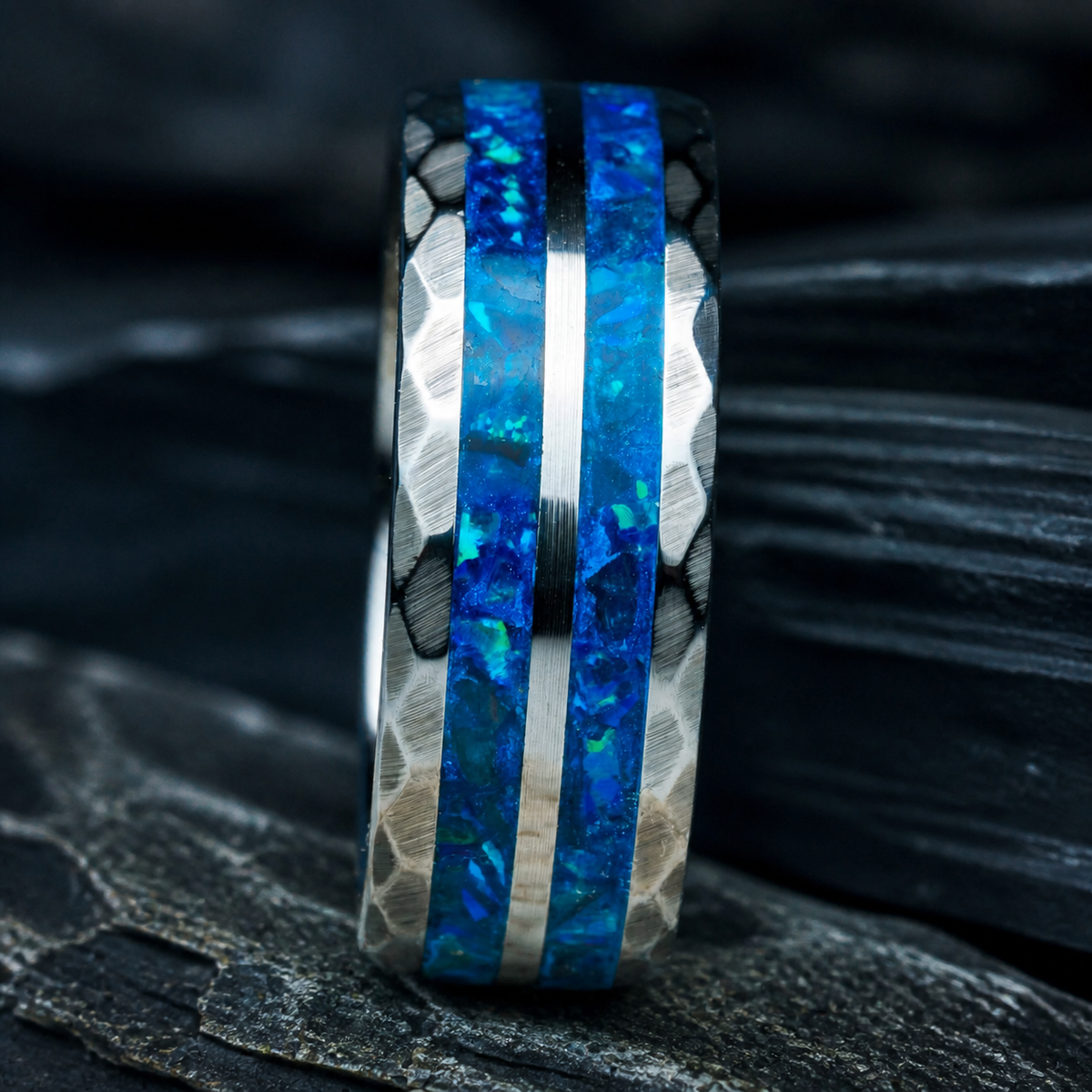 Front detail of Neptune’s Anvil cobalt blue inlay ring on charcoal stratified slate