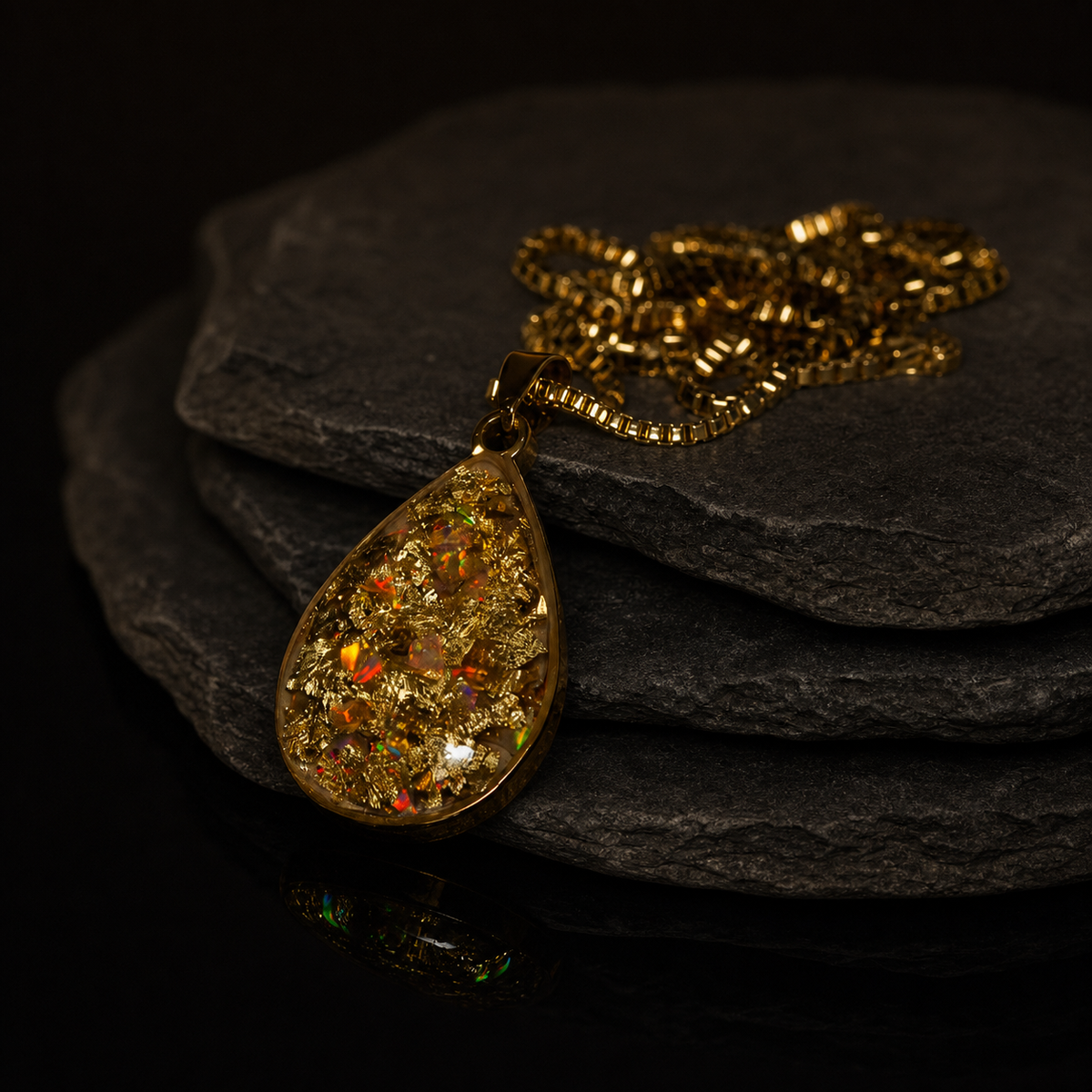 Gilded Blue Amber Reliquary Pendant, pendant, display view.