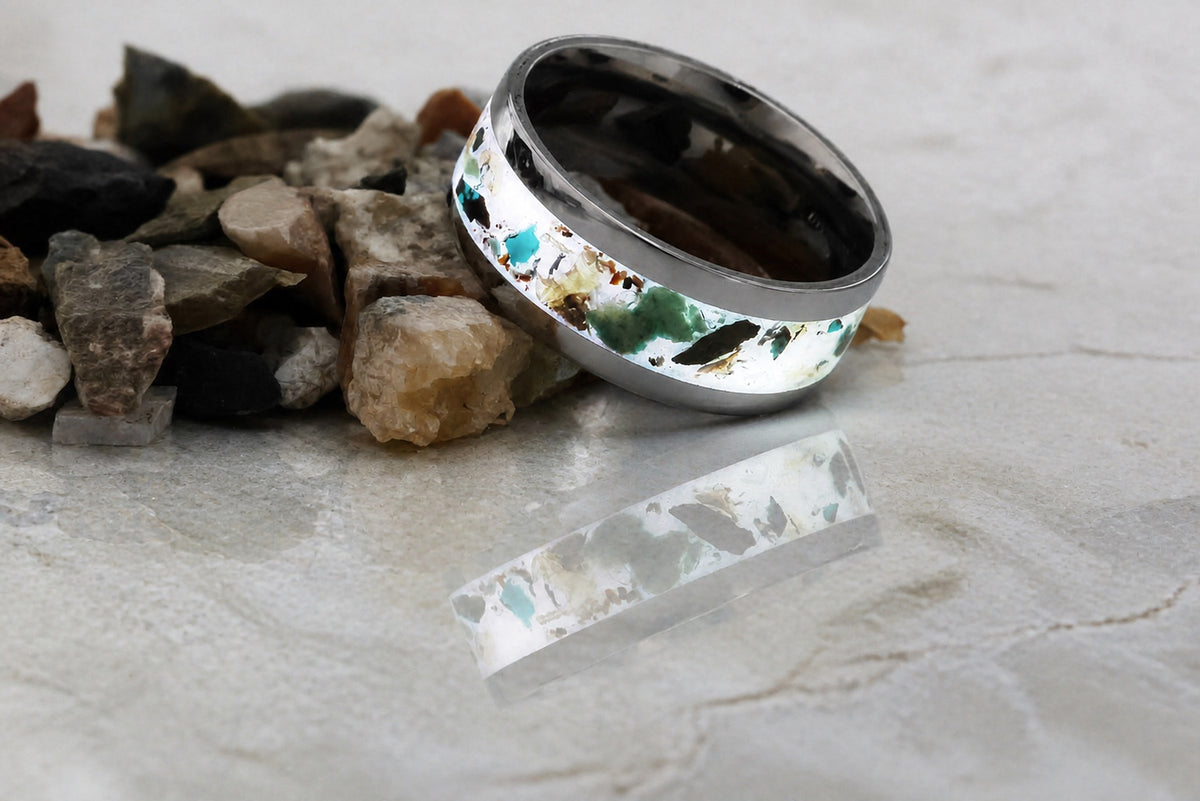 Front detail of The Remnant Archive Ring and its stone fragments