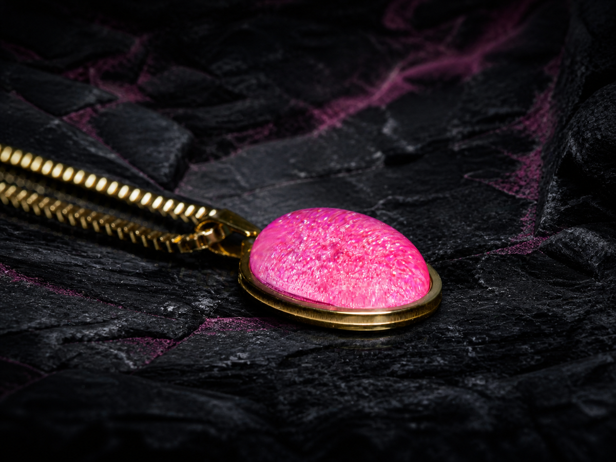 Angled view of the Rose Strata pendant and gold box chain
