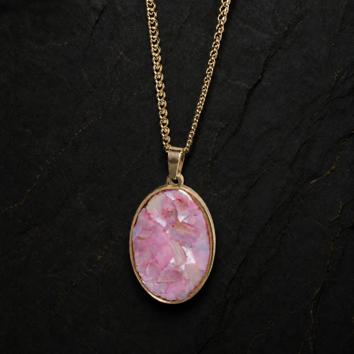 Roselight Oval pendant front view showing pink abalone shell inlay