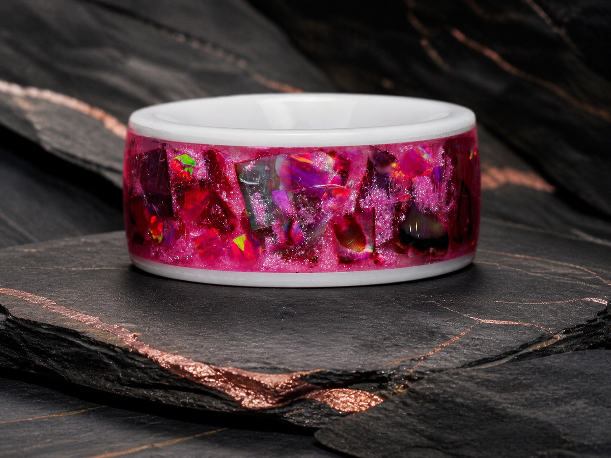 Rosetide Lumina pink shell and opal inlay ring detail on dark stone