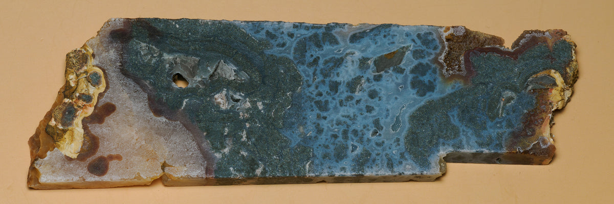 Second face of the marcasite-labelled Sulawesi slab, with blue-grey patterning and cream-coloured edge