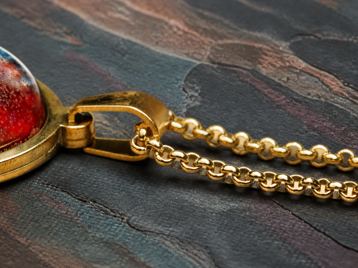 Bail and fine gold chain detail for the Thermal Rift pendant necklace