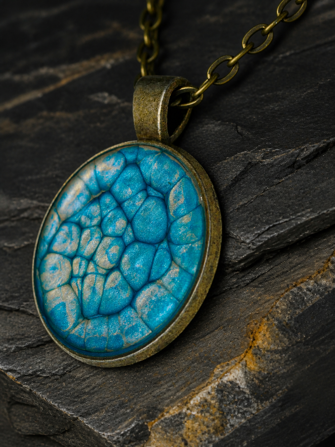 Macro detail of the Thevenard Vein pendant bezel, bail and chain