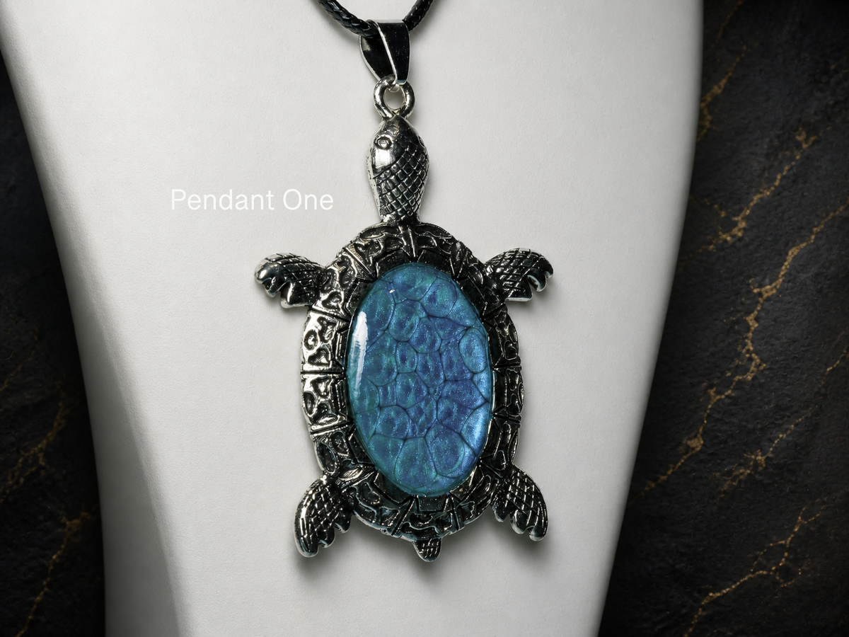 Pendant One hand-painted turquoise turtle pendant front view