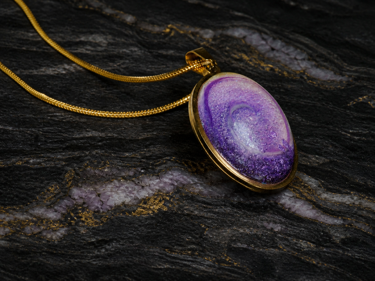Violet Gyre oval pendant in violet resin, angled view