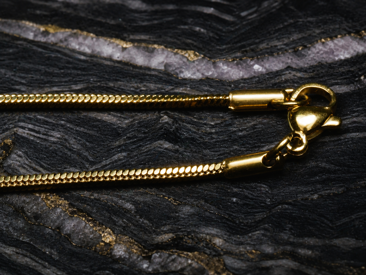 Violet Gyre gold-plated stainless-steel snake chain clasp detail