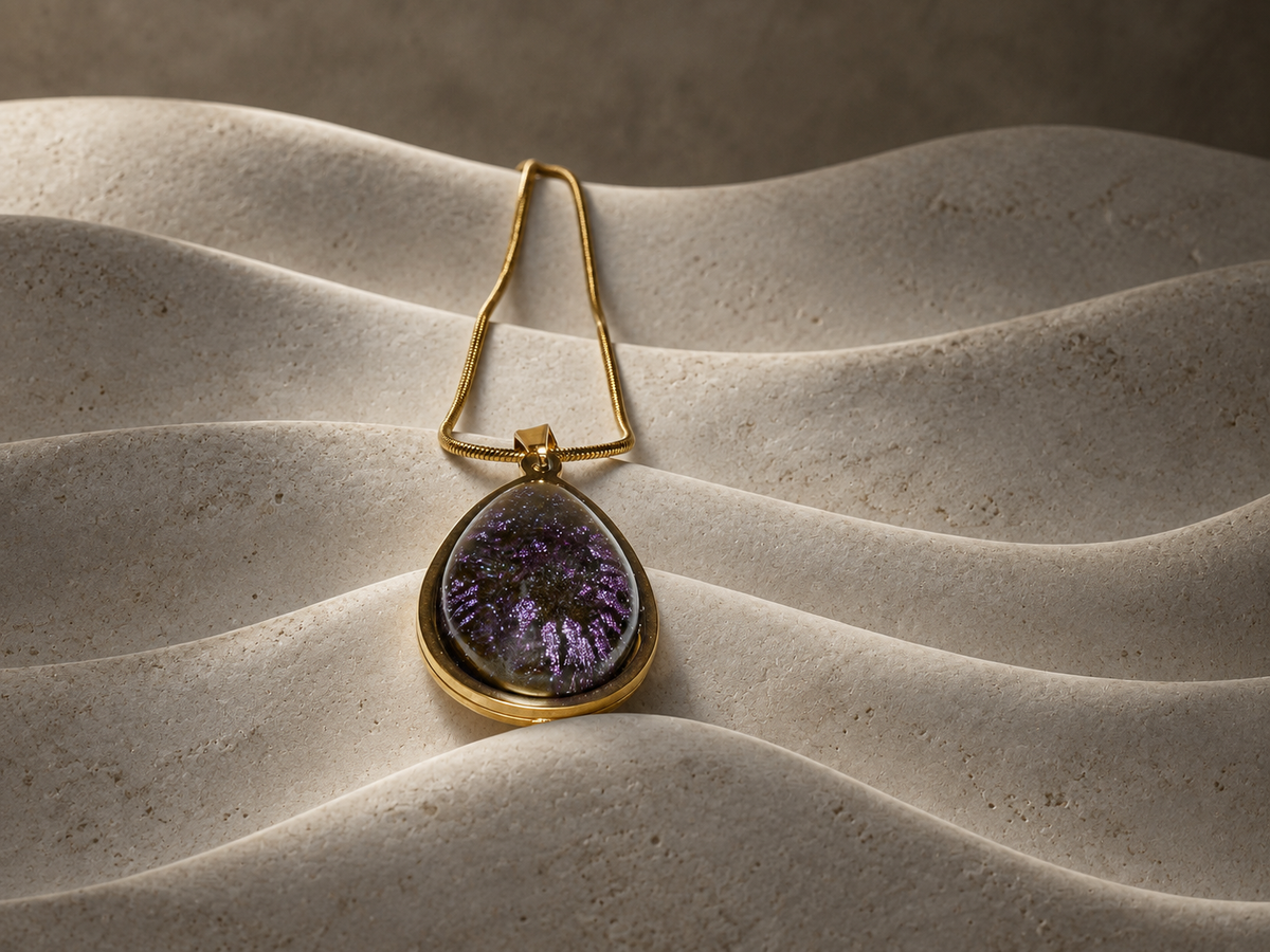 Violet Orbit teardrop pendant necklace on sculptural folded forms