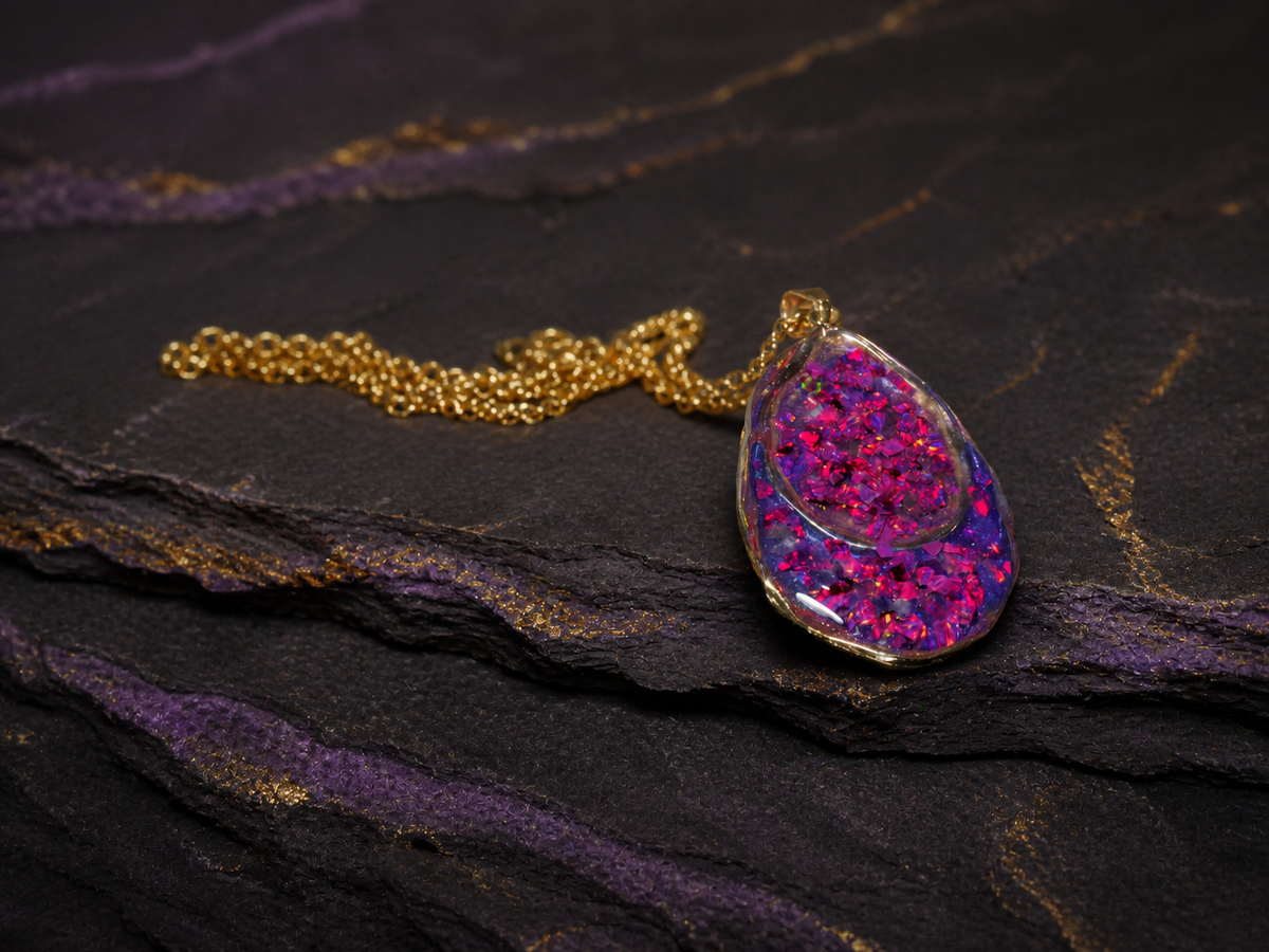 Pink and purple double teardrop pendant with fine gold-toned chain